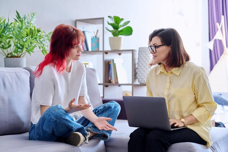 therapy-session-for-teenage-girl-psychologist-and-2022-06-28-22-46-33-utc-min